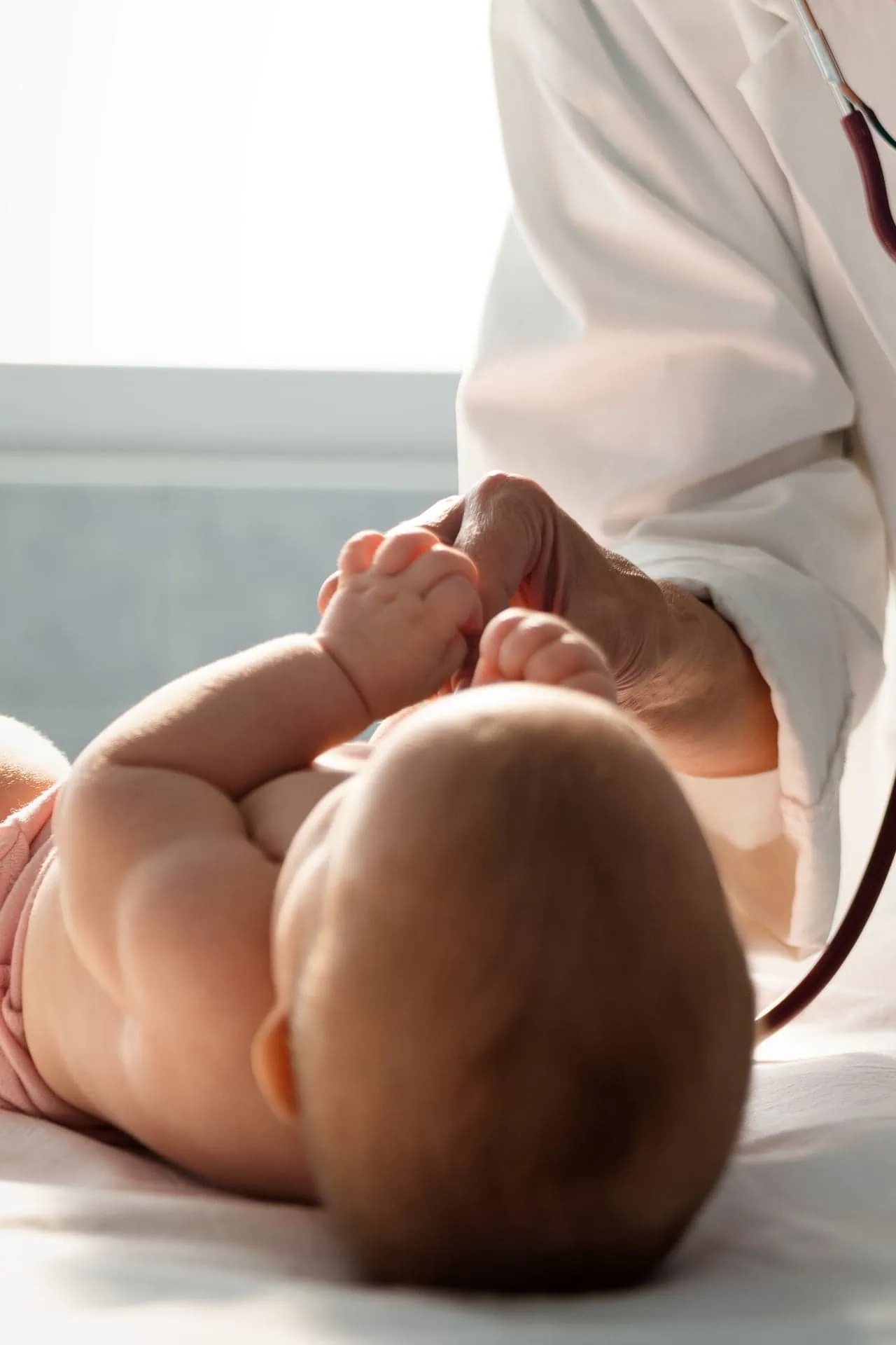 newborn at pediatricians clinic